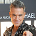 Robbie Williams reveló que padece una forma de síndrome de Tourette